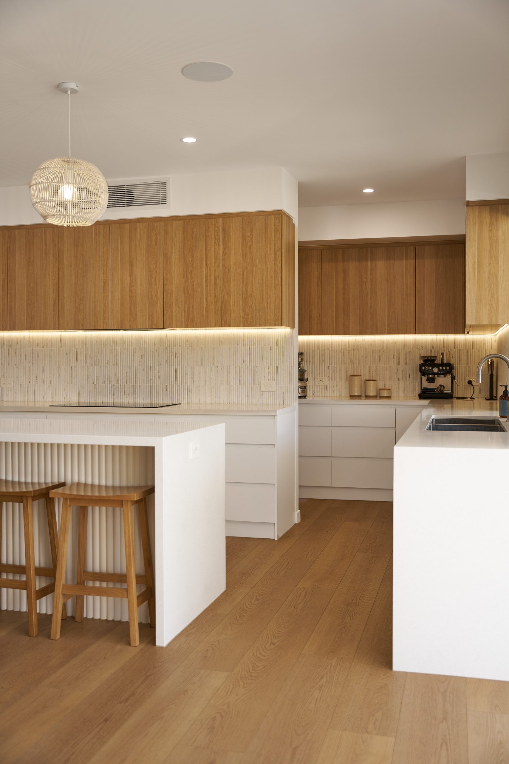 Modern kitchen with wooden cabinets and island