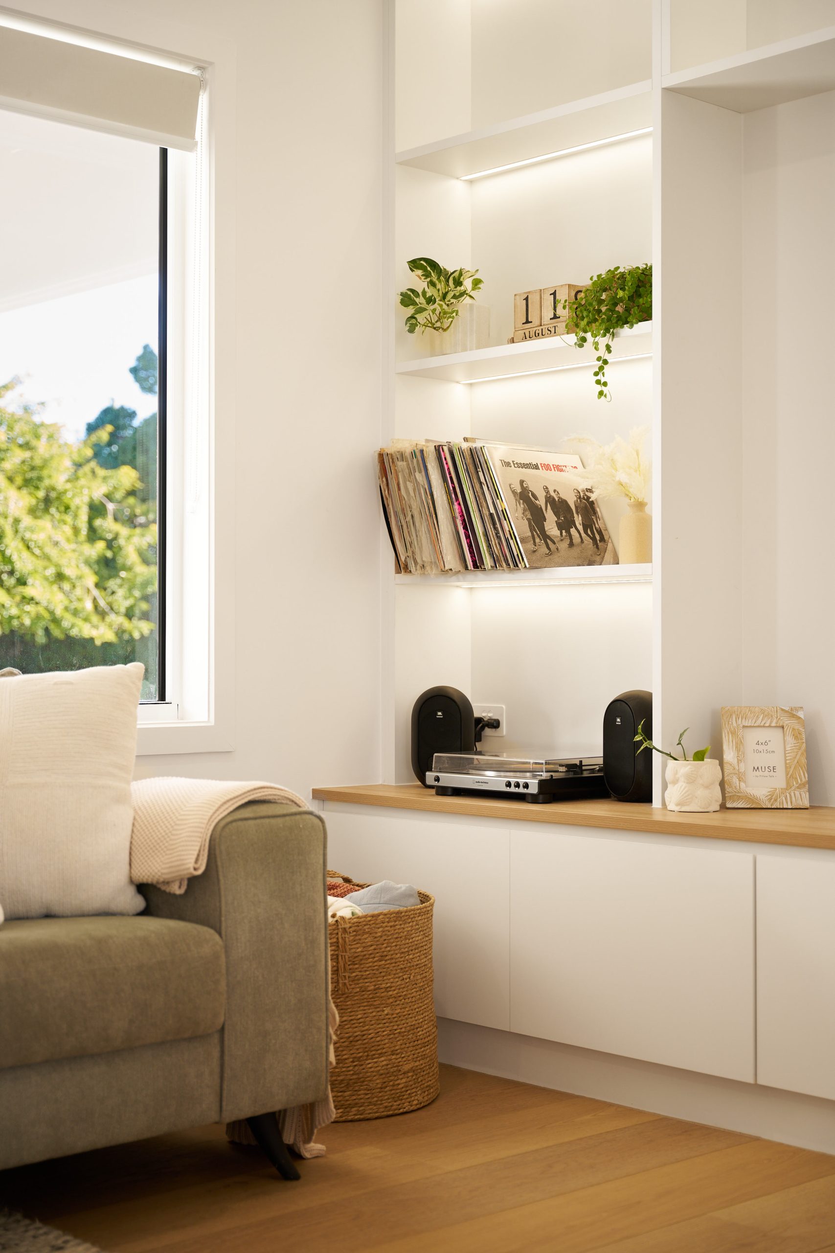 Cozy living room with records and houseplants